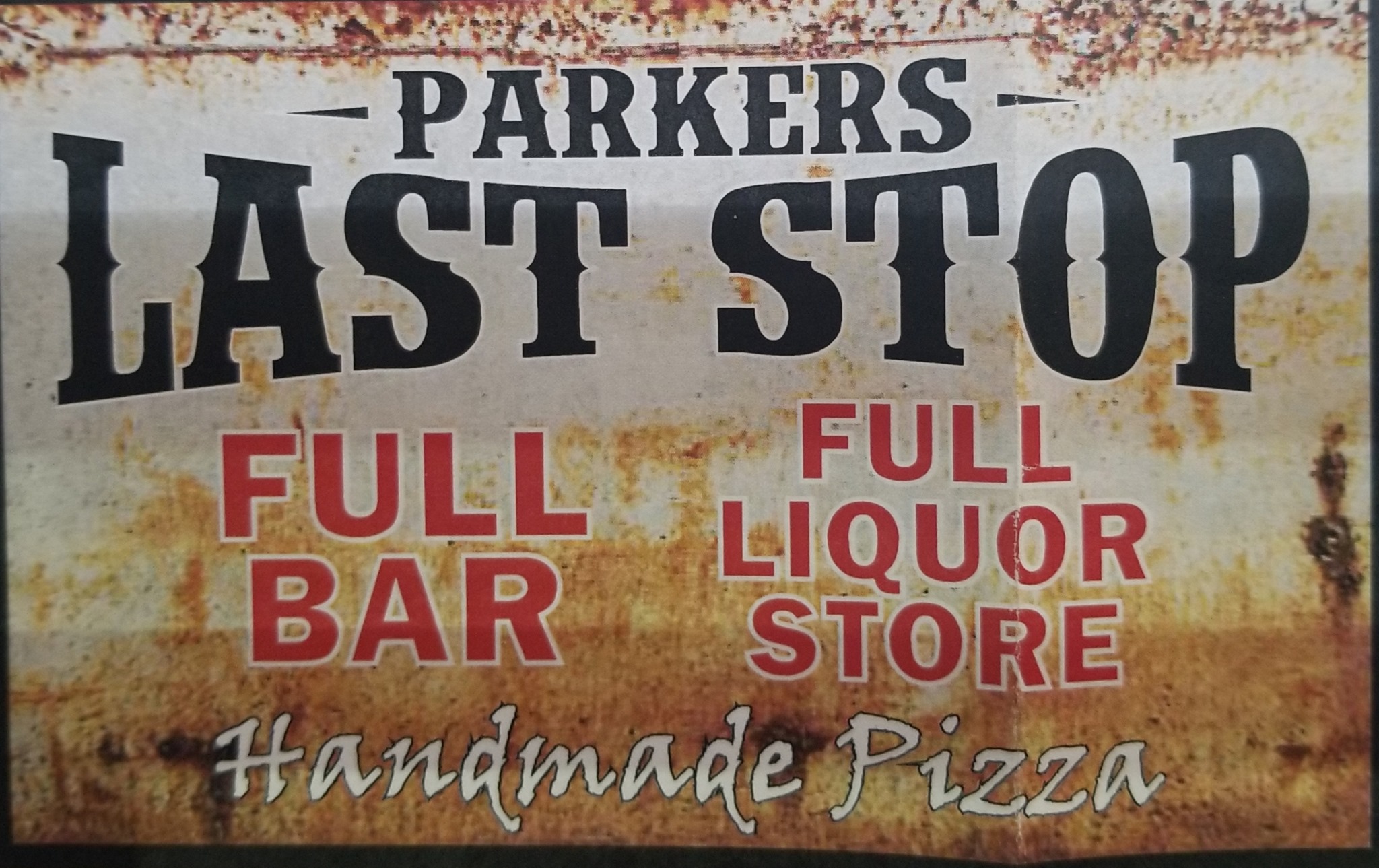 parkers-last-stop-sign A sign for Parkers Last Stop liquor store and bar.