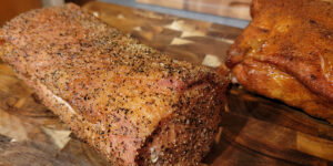 A seasoned and baked whole pork loin.