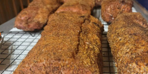Pork loin cooling after being baked.