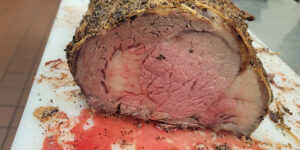 A closeup of a sliced prime rib.