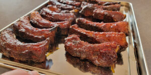 Individual ribs that have been sauced.